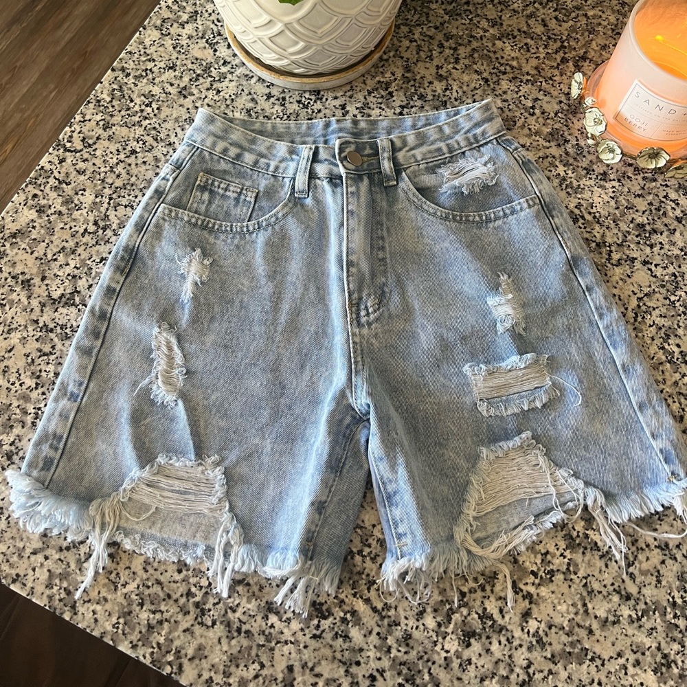 Brand New light denim distressed shorts